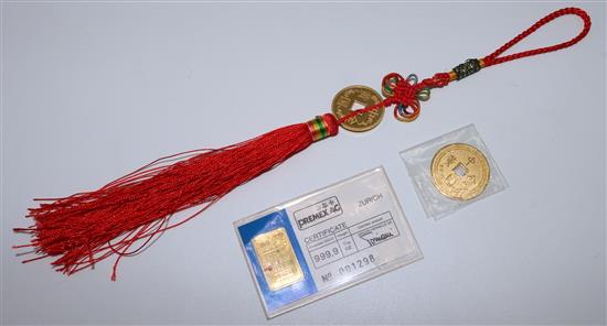 Two Chinese .9999 purity pierced gold coins and a Swiss 1/10oz gold bar (16.83 grams total)